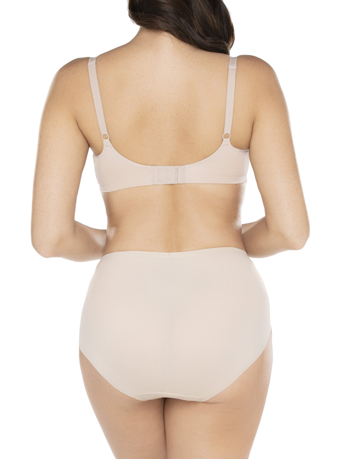 a woman wearing nude tummy control underwear