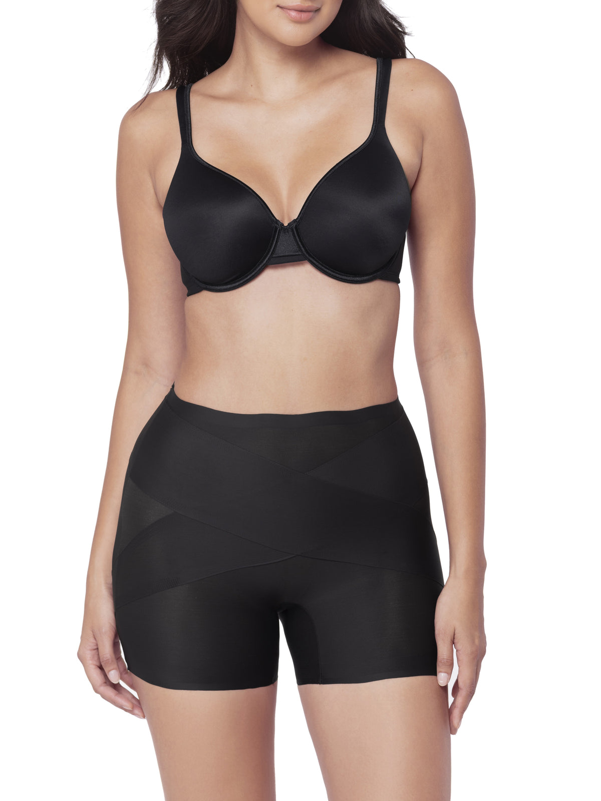 Black shapewear short on a model against a white background