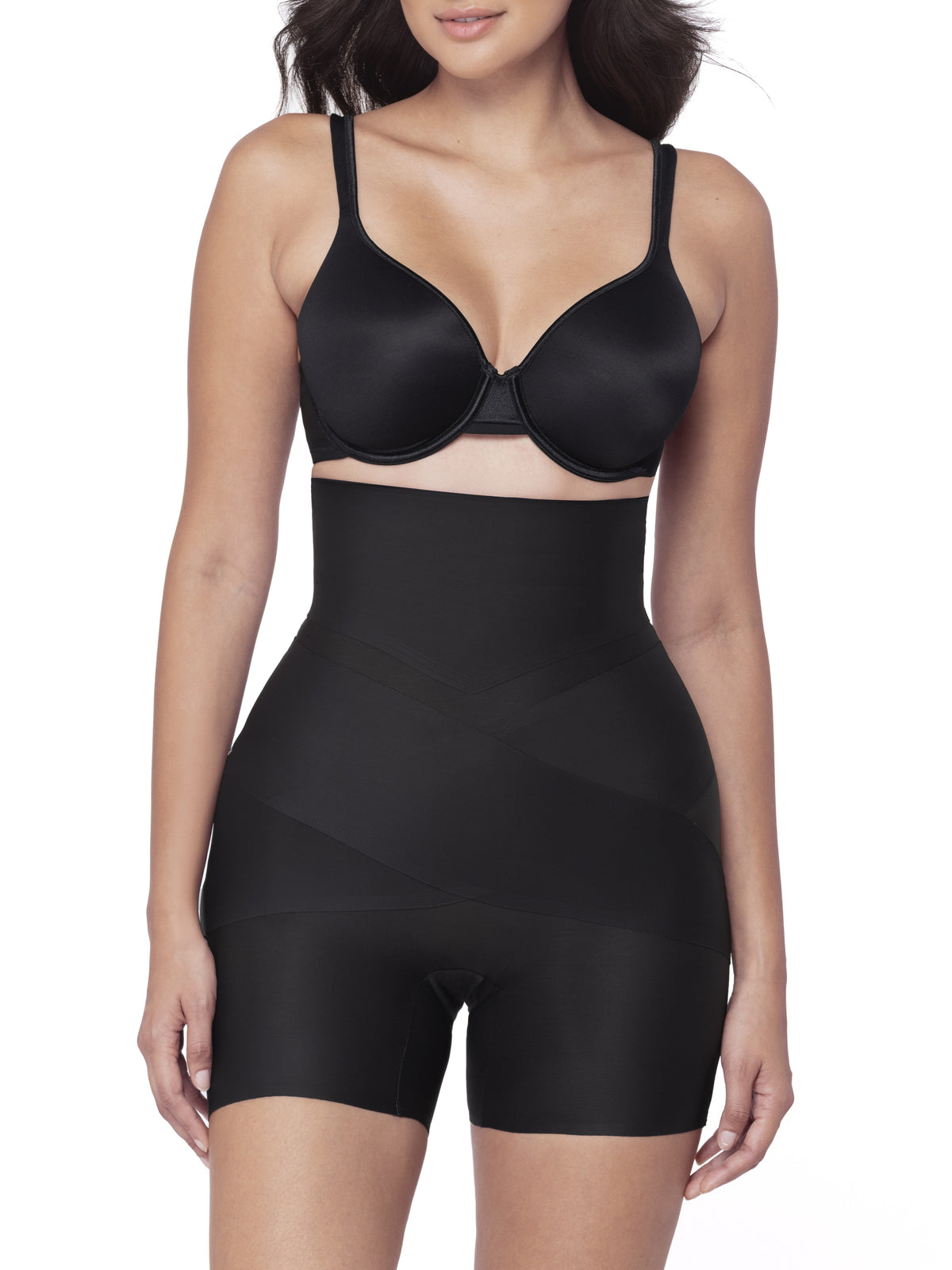 Black shapewear shorts worn by a model on a white background