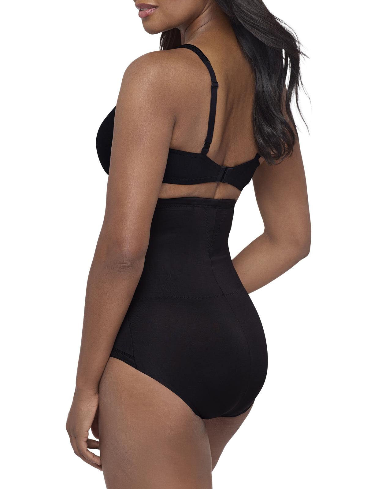 a woman wearing a black high waisted back smoothing tummy control brief miraclesuit