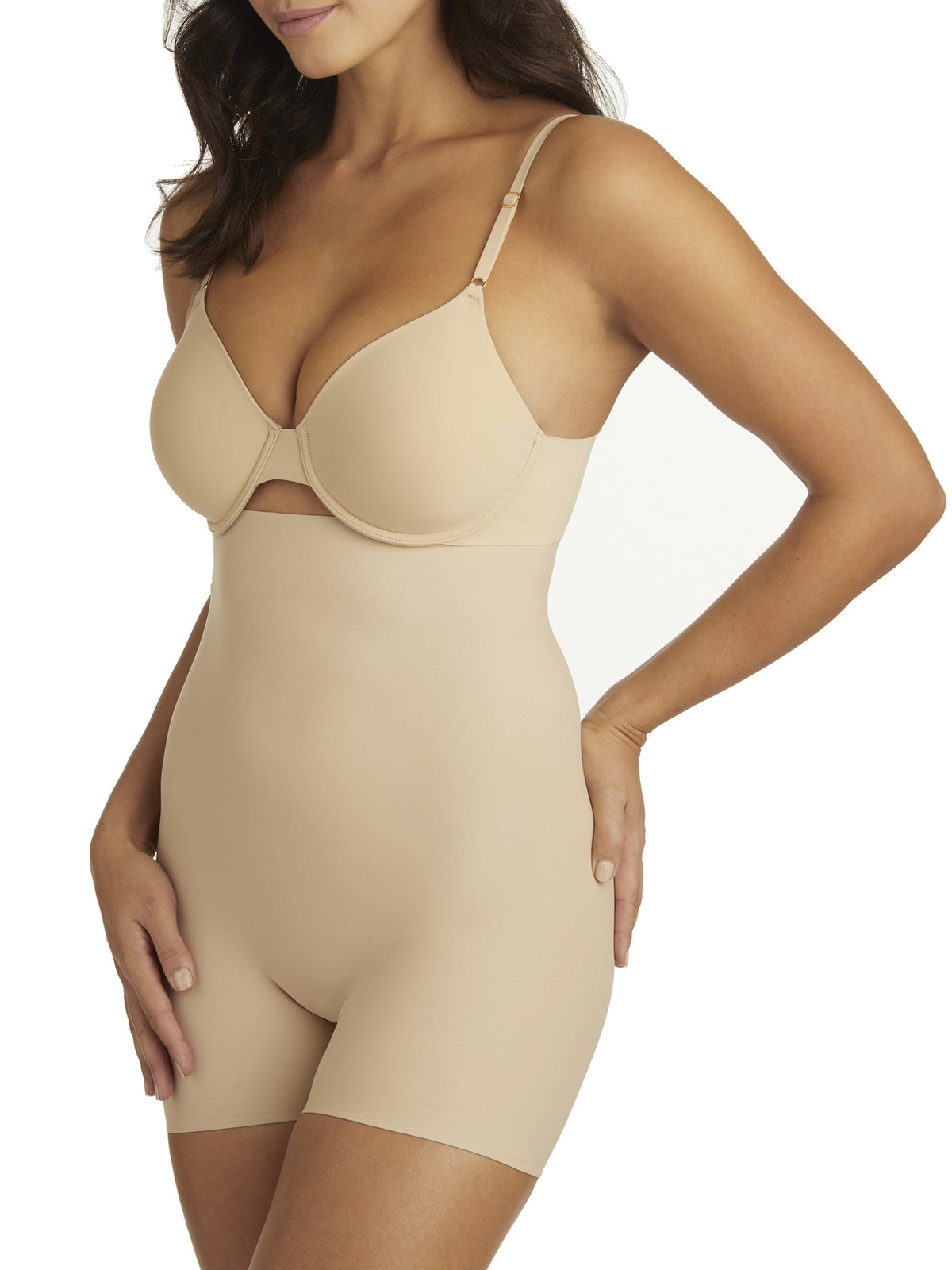 a woman wearing nude high waisted tummy control shapewear shorts