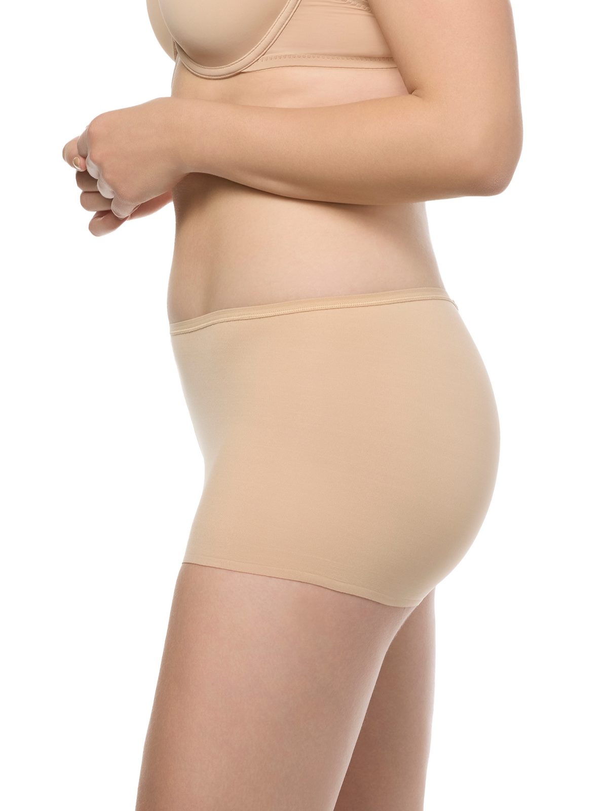 a woman wearing a beige boyshort panty underwear