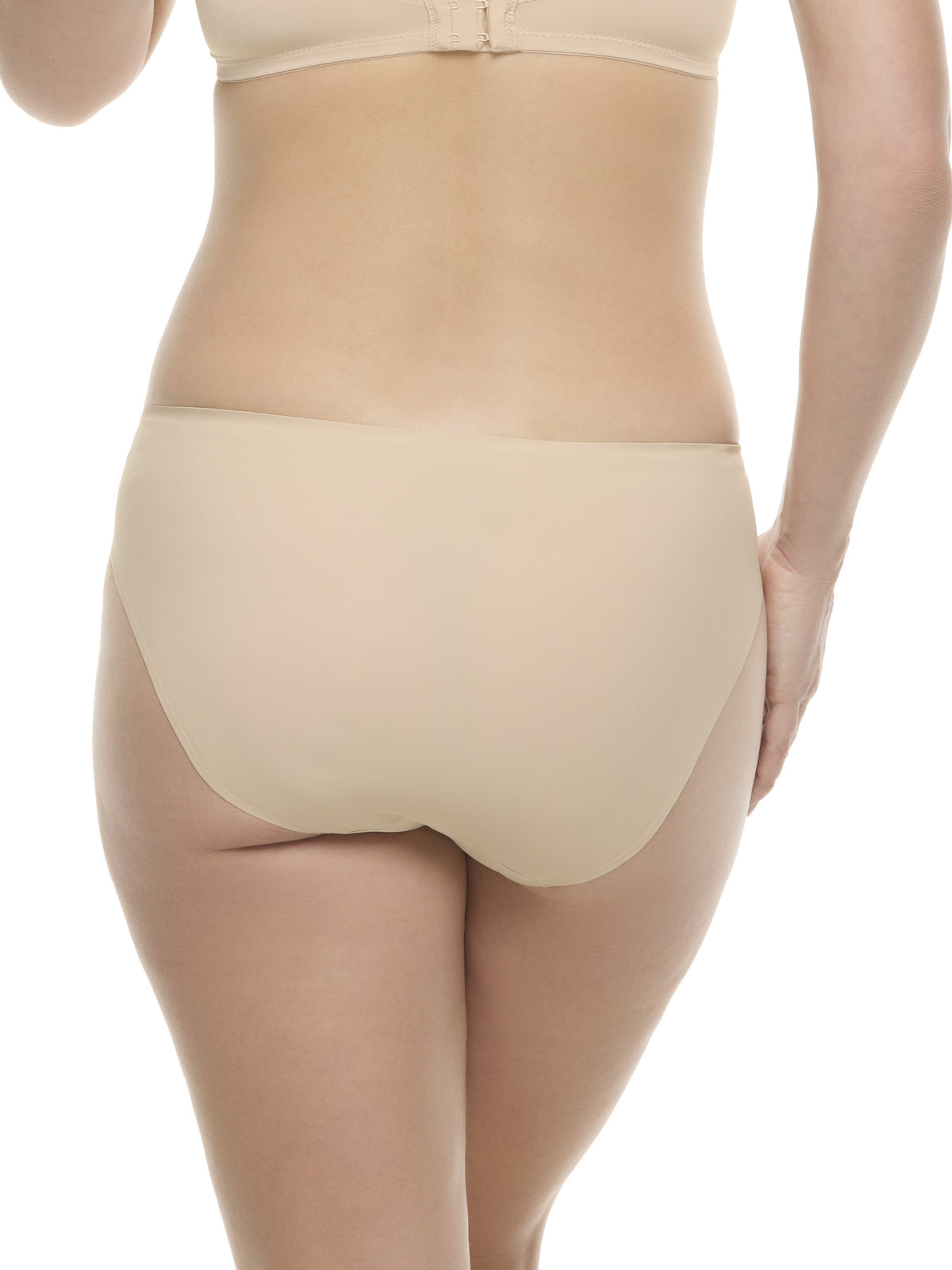 a woman wearing a beige hipster panty underwear