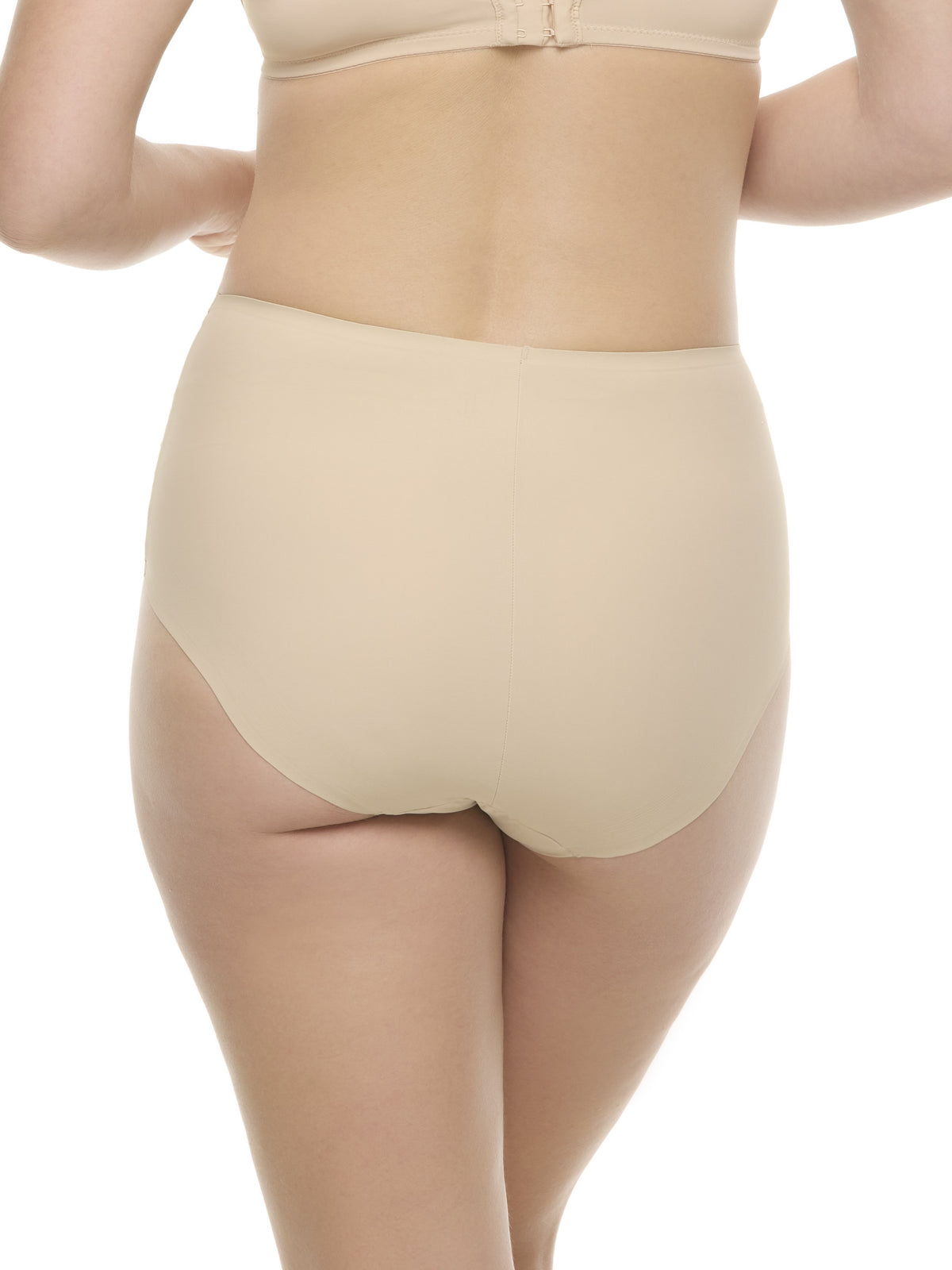 a woman wearing beige brief panty underwear