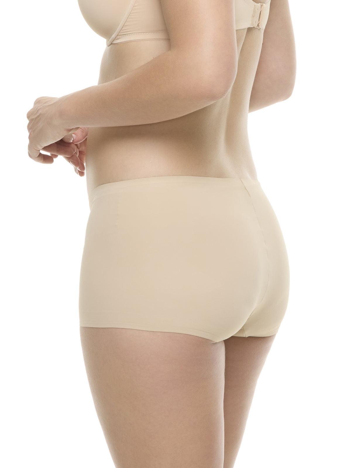 a woman wearing a warm beige color boyshort panty underwear