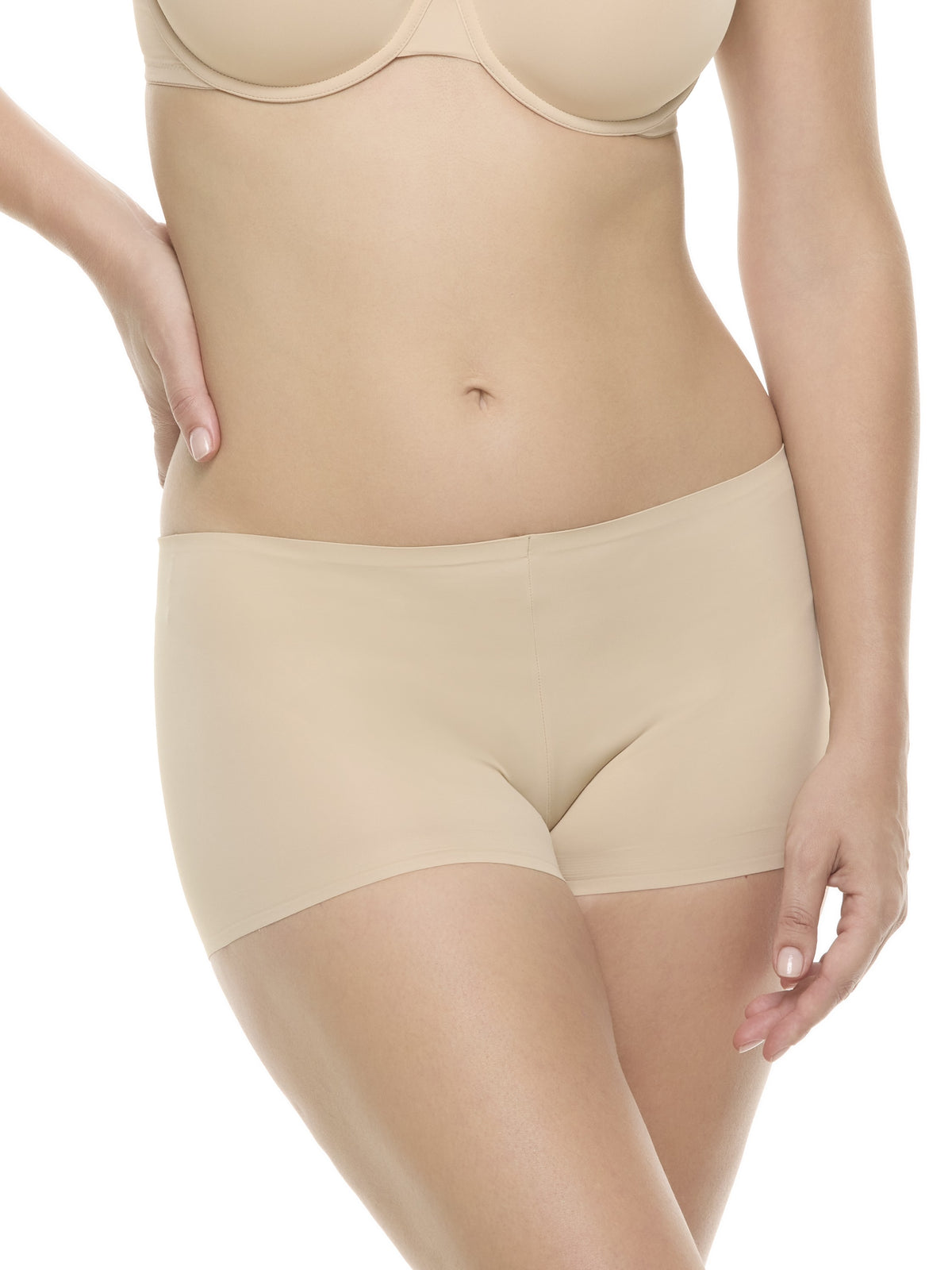 a woman wearing a warm beige color boyshort panty underwear