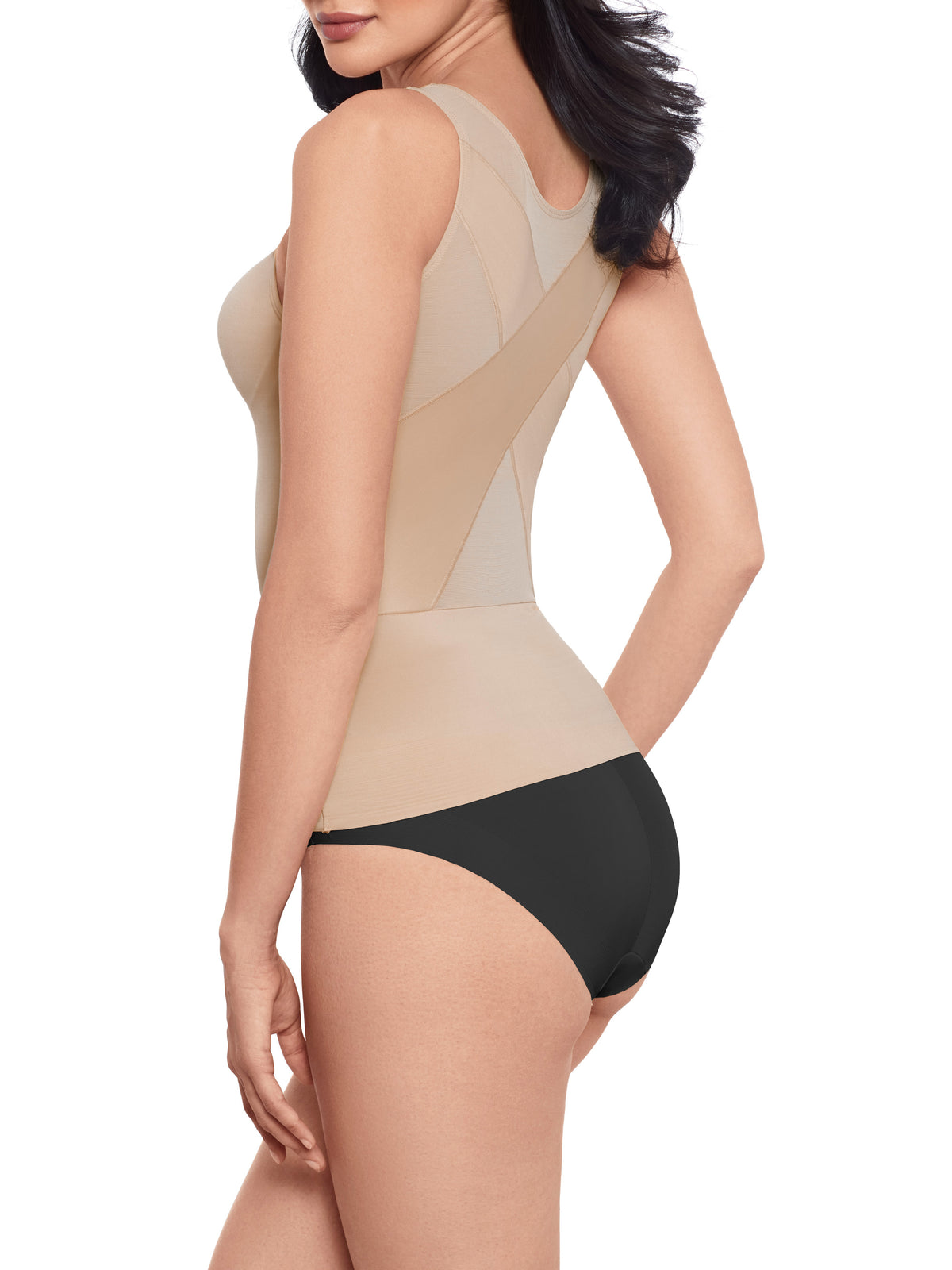 a woman wearing a nude back smoothing tummy control cami shapewear