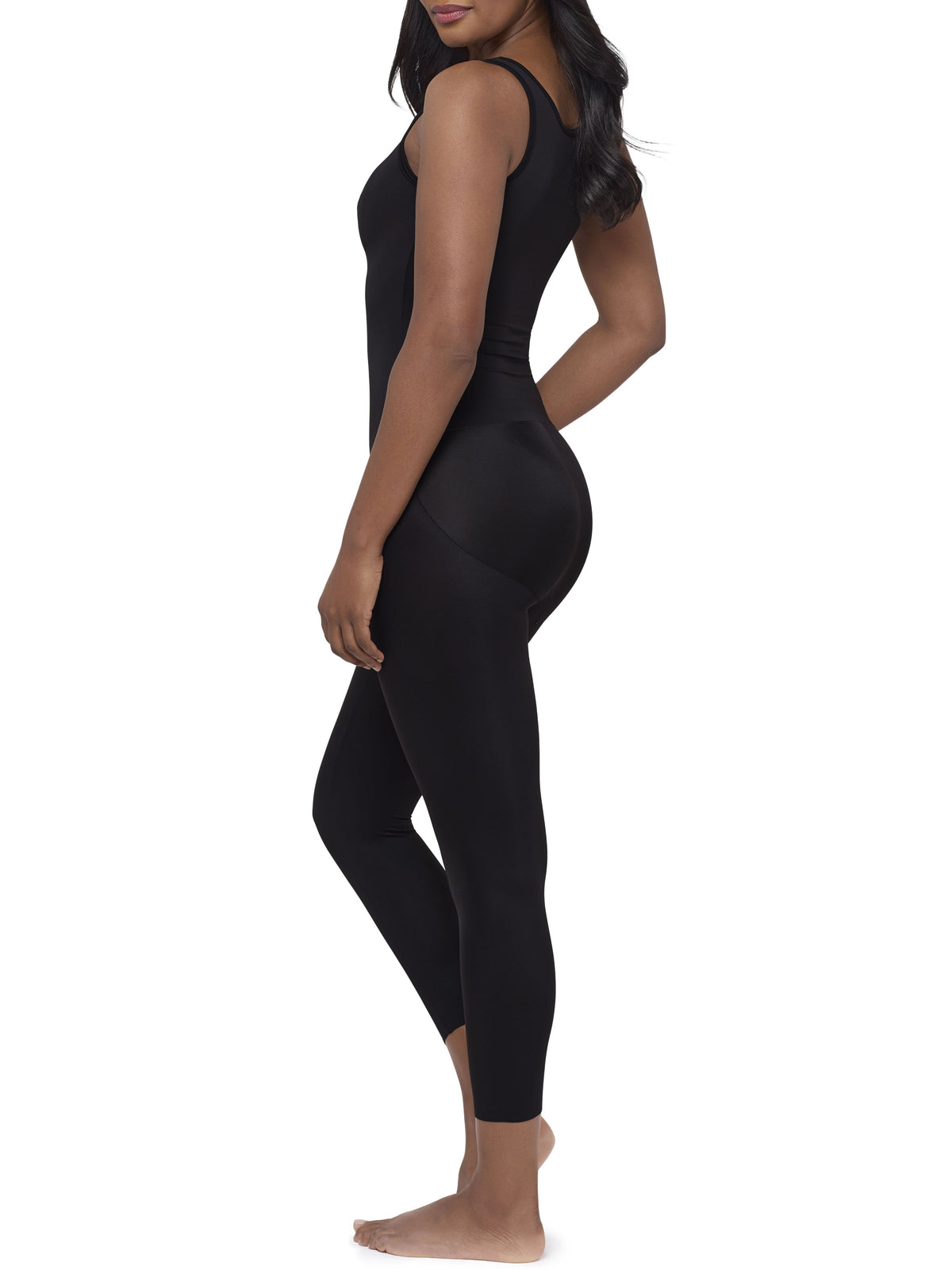 A woman modeling a full-body black shaper bodysuit or against a plain white background.