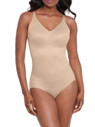 a woman wearing a nude shaping bodysuit shapewear