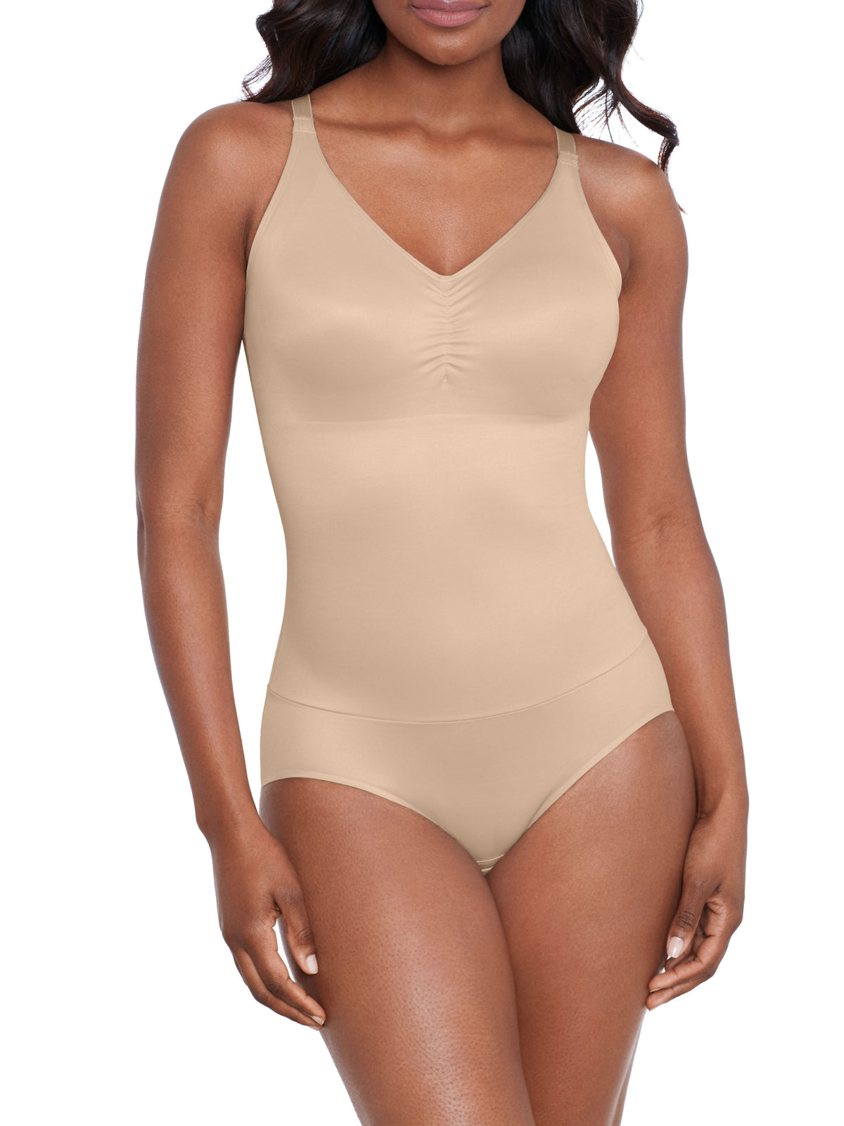 a woman wearing a nude shaping bodysuit shapewear