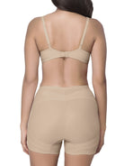 Beige shapewear short on a model against a white background