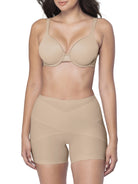 Beige shapewear short on a model against a white background