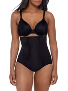a woman wearing a black high waisted tummy control brief miraclesuit shapewear body shaper