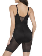 a woman wearing a black open bust torsette body shaper sheer shapewear
