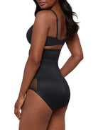 a woman wearing black high waisted sheer shapewear tummy control brief