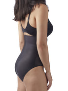 a woman wearing black high waisted tummy control underwear