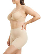 a woman wearing a nude tummy control shapewear short