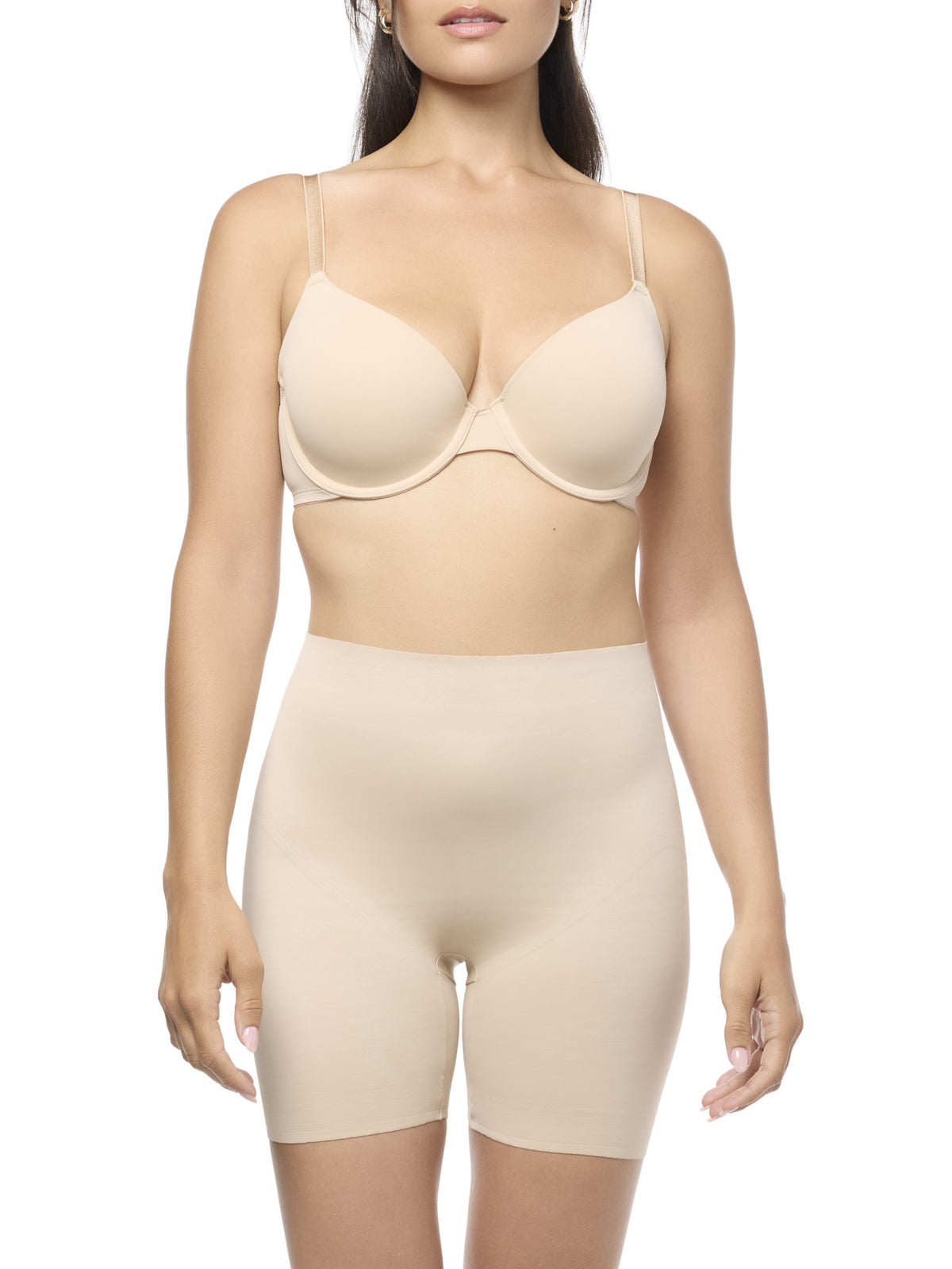 Woman wearing a beige shapewear short