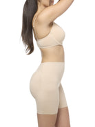 Woman wearing a beige shapewear short