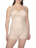 a woman wearing a nude high waisted tummy control shapewear short