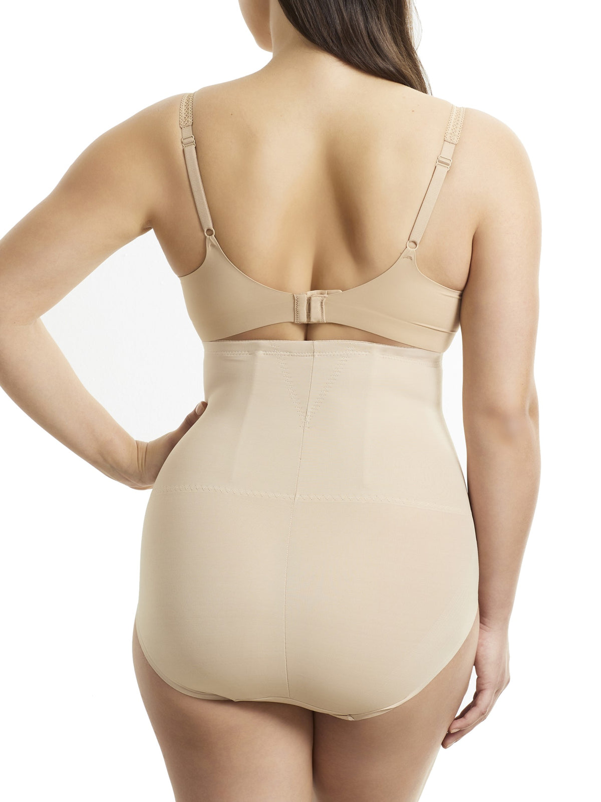 a woman wearing nude high waisted tummy control underwear shapewear