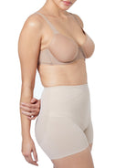 a woman wearing nude tummy control shapewear shorts