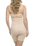 a woman wearing a beige high waisted tummy control thigh slimmer body shaper shapewear