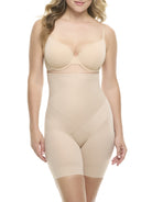 a woman wearing a beige high waisted tummy control thigh slimmer body shaper shapewear