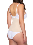 a woman wearing nude waist cincher wait trainer shapewear