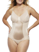a woman wearing a nude tummy control shapewear bodysuit