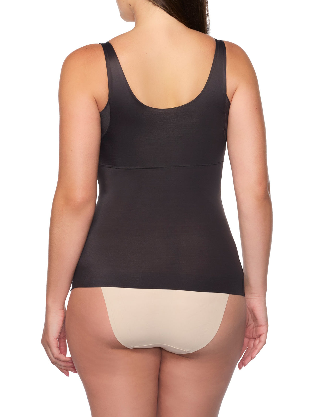 a woman wearing a black tummy control shaping camisole shapewear