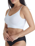 a woman wearing a white wireless bra