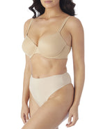 a woman wearing nude tummy control thong underwear