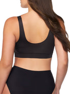 a woman wearing a black bralette wireless bra