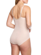 a woman wearing a nude tummy control body shaper shapewear
