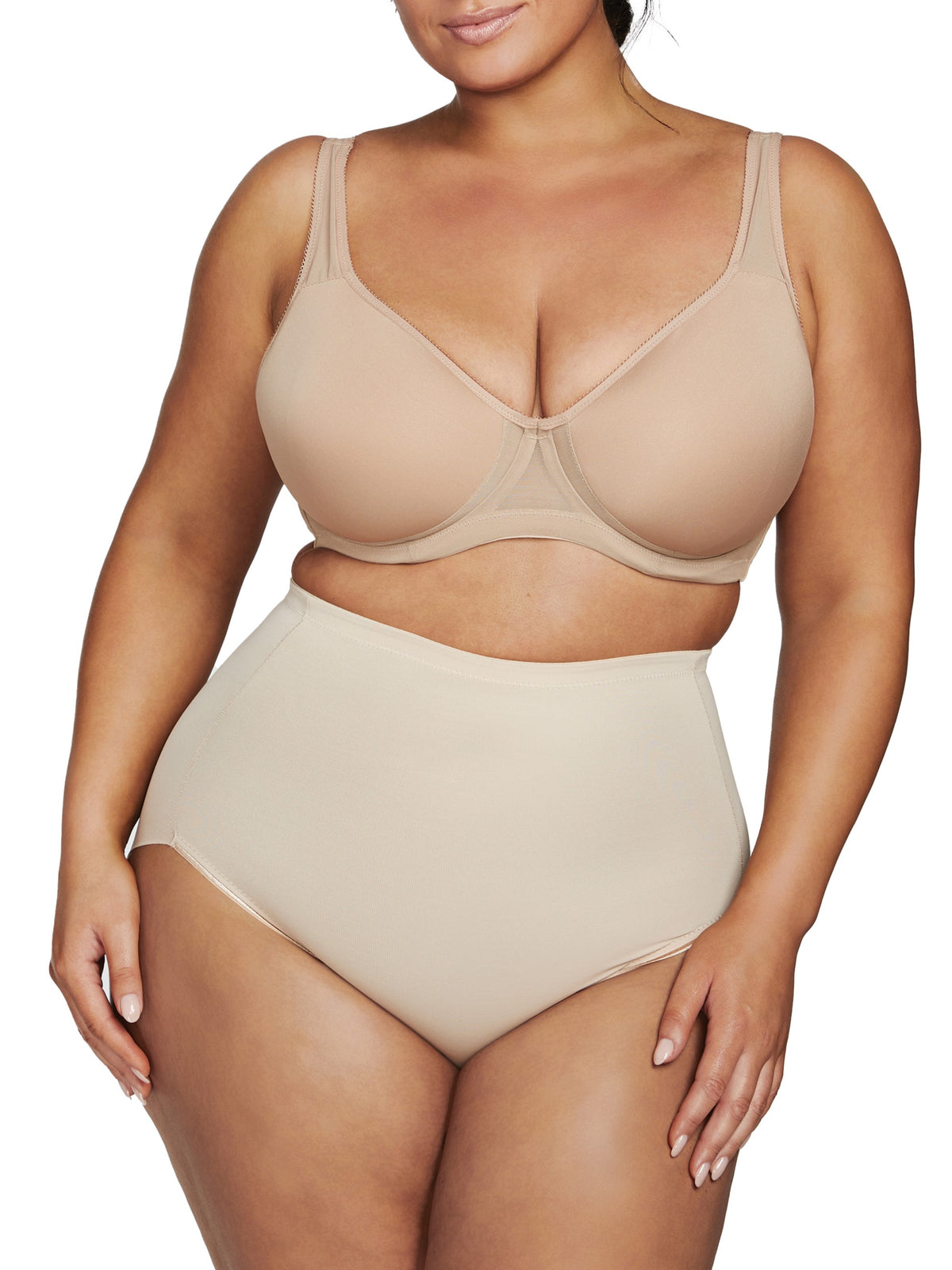 a woman wearing nude plus size tummy control underwear shapewear
