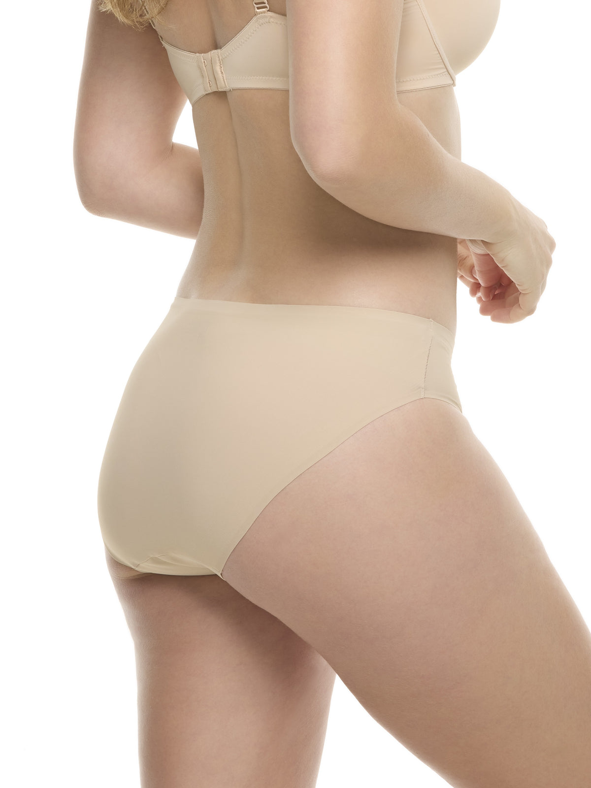 a woman wearing a beige hipster panty underwear