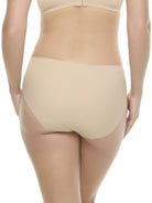 a woman wearing a beige high-cut brief panty underwear
