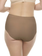 a woman wearing a dark sand color brief panty underwear