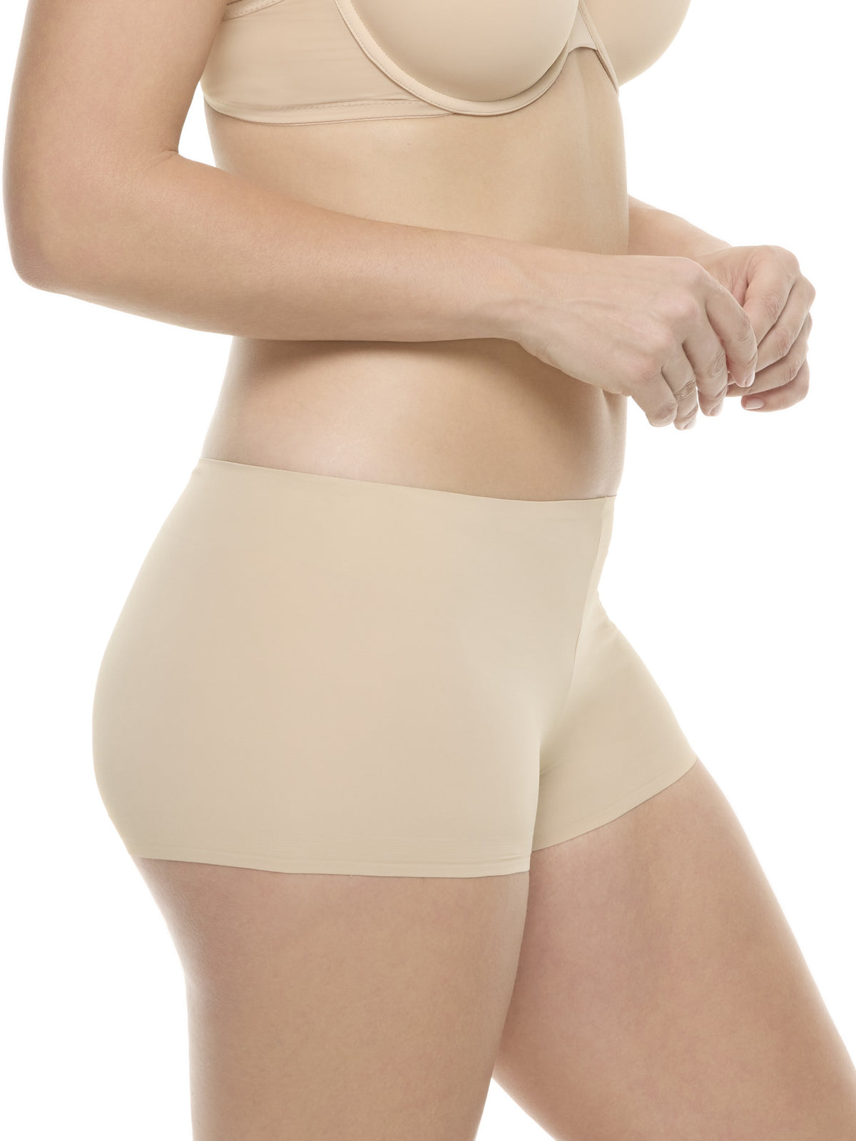 a woman wearing a warm beige color boyshort panty underwear