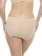 a woman wearing a beige color hipster panty underwear