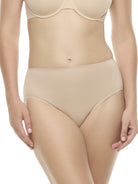 a woman wearing a beige color high-cut brief panty underwear