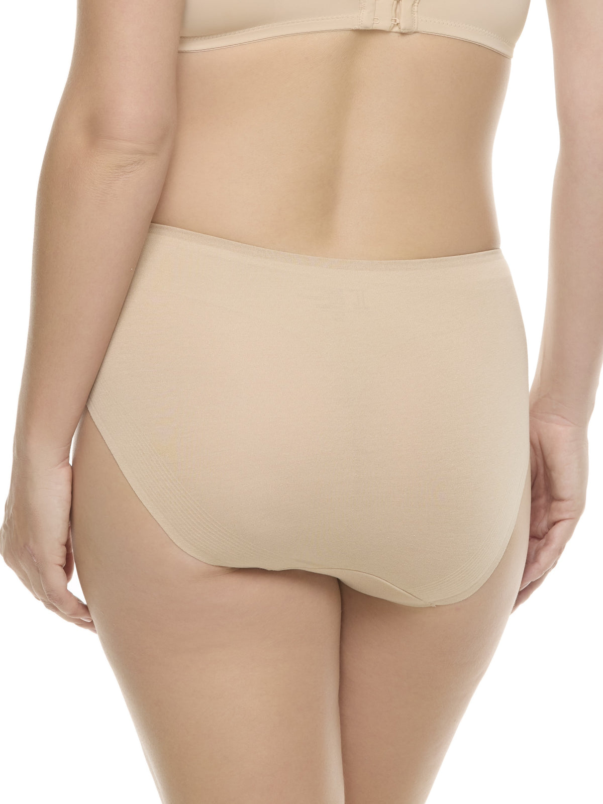 a woman wearing a beige color high-cut brief panty underwear