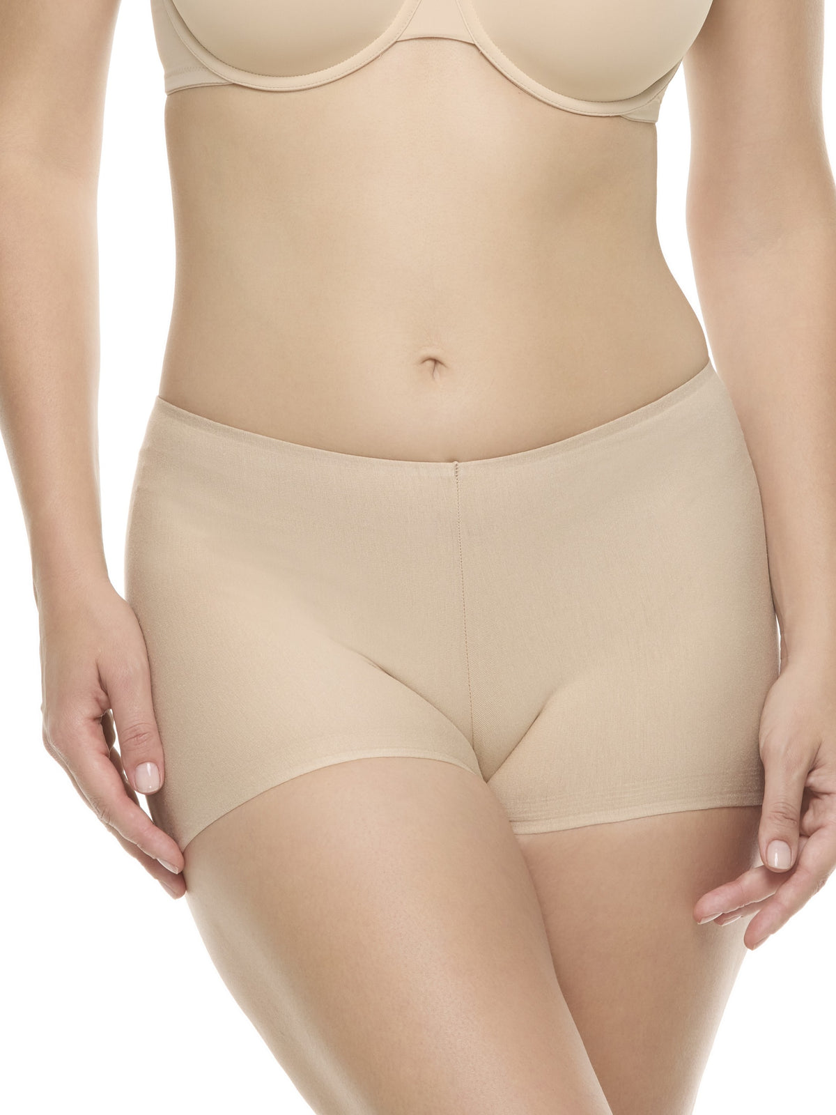 a woman wearing a beige color boyshort panty underwear