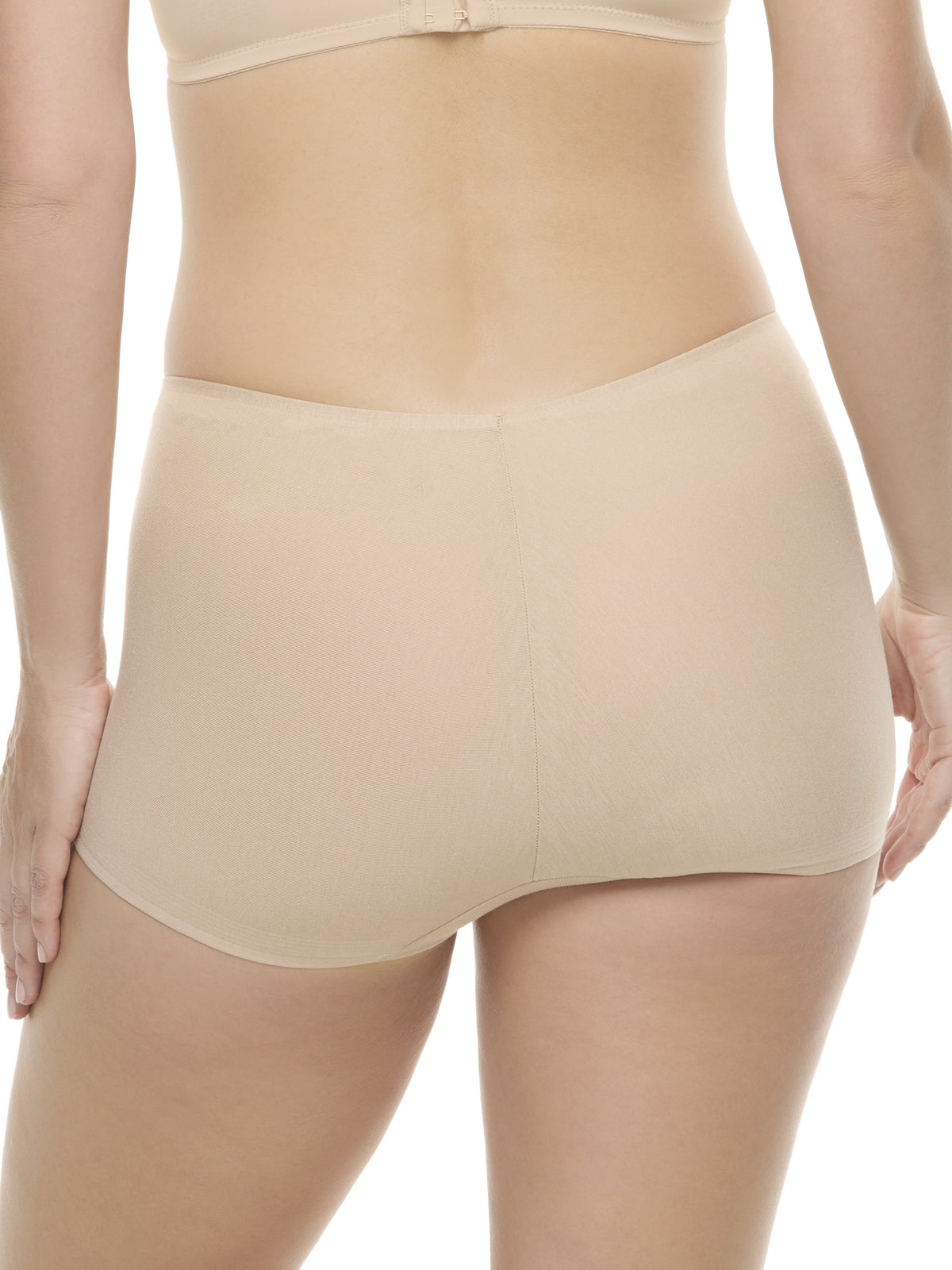 a woman wearing a beige color boyshort panty underwear
