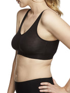 a woman wearing a black bralette